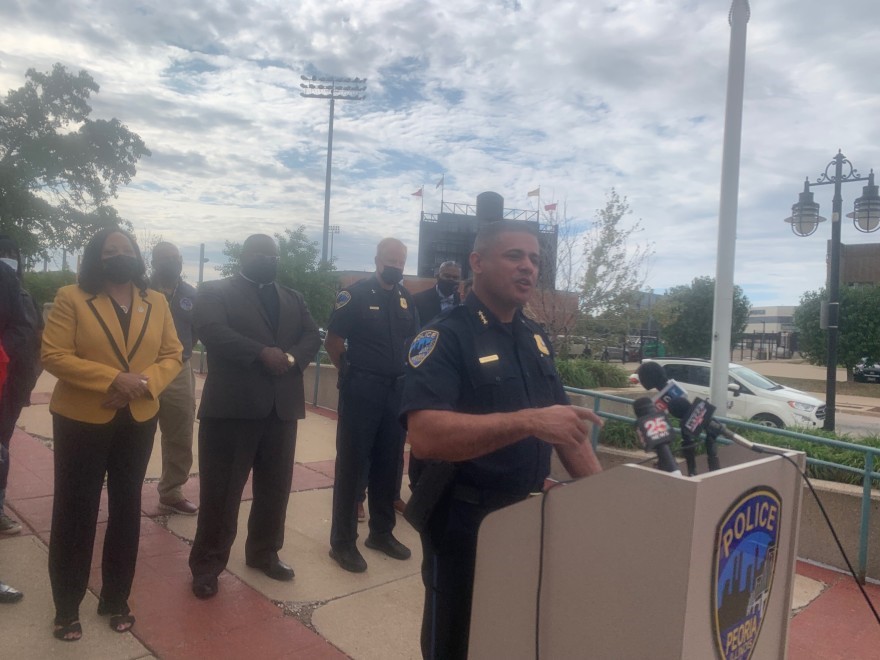 Hannah Alani - Peoria Police Department Chief Eric Echevarria stands alongside Peoria community and political leaders on Tuesday, Sept. 21